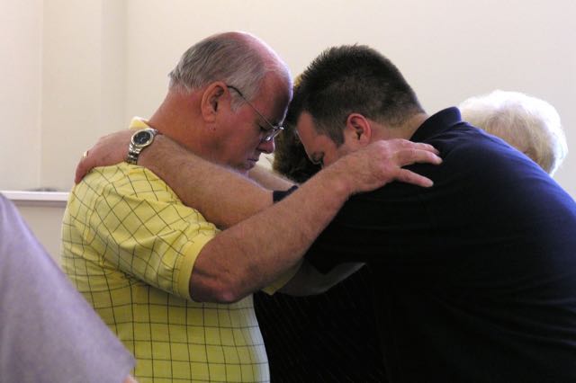 Men praying